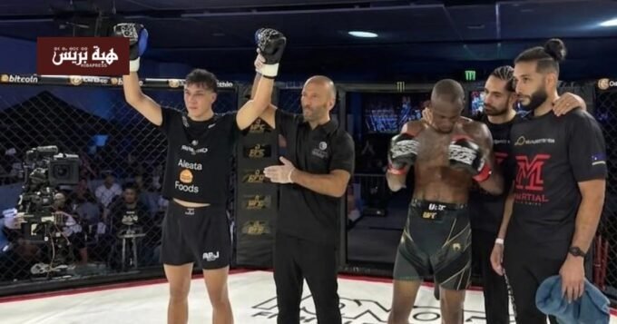 البطل المغربي شرف معطى الله يحمل حزام بطولة Honor Fight League بعد فوزه في كوراساو.