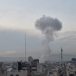 Dell logo against a backdrop of a map of the Middle East, symbolizing corporate presence amidst regional challenges.