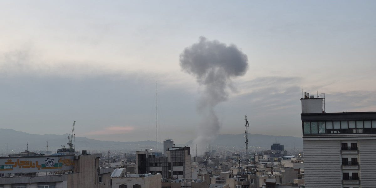 Dell logo against a backdrop of a map of the Middle East, symbolizing corporate presence amidst regional challenges.