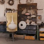 A collection of sculptural lamps from Endless Flat Studio, featuring delicate Japanese Kozo paper shades on hand-bent stainless steel bases, inspired by serpentine forms and ancient narratives.