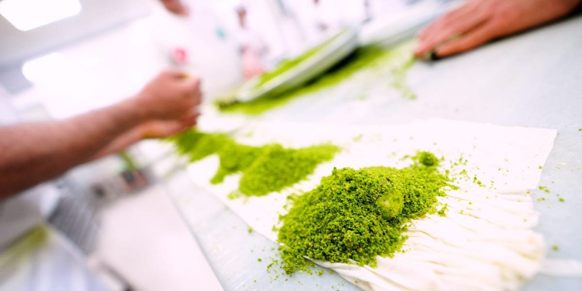 Burhan Cagdas preparing traditional baklava by hand at Imam Cagdas in Gaziantep.
