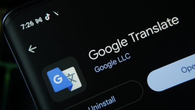 Google Translate app interface showing pronunciation practice feature with microphone icon
