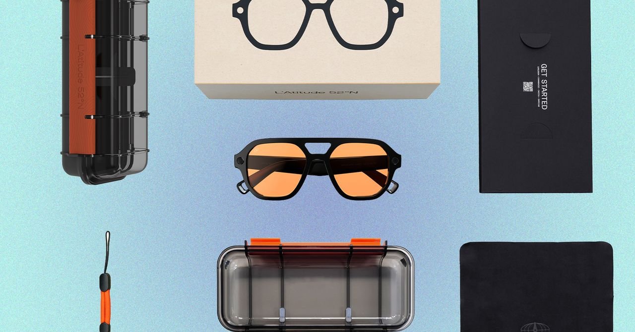 A person wearing sleek L'Atitude 52°N Berlin smart glasses, looking at a museum exhibit, with a subtle digital overlay suggesting AI interaction.