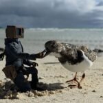Makers and visitors interacting with innovative projects at Maker Faire Philadelphia 2026 on Cherry Street Pier.