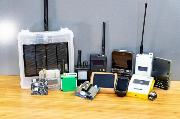 A comparison of Meshtastic node hardware, including the LilyGo T-Echo, Seeed SenseCAP Card Tracker T1000-E, and LilyGo T-Deck, showcasing diverse form factors.
