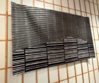 Diverse and innovative rug collections showcased at Milan Design Week, highlighting modern design and craftsmanship.