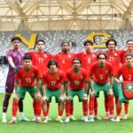 Morocco U17 football team celebrating their UNAF Tournament victory with the trophy.