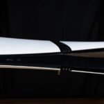 PlayStation 5 Pro console with controller, highlighting the sleek design and powerful gaming experience.