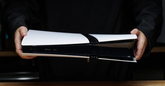 PlayStation 5 Pro console with controller, highlighting the sleek design and powerful gaming experience.