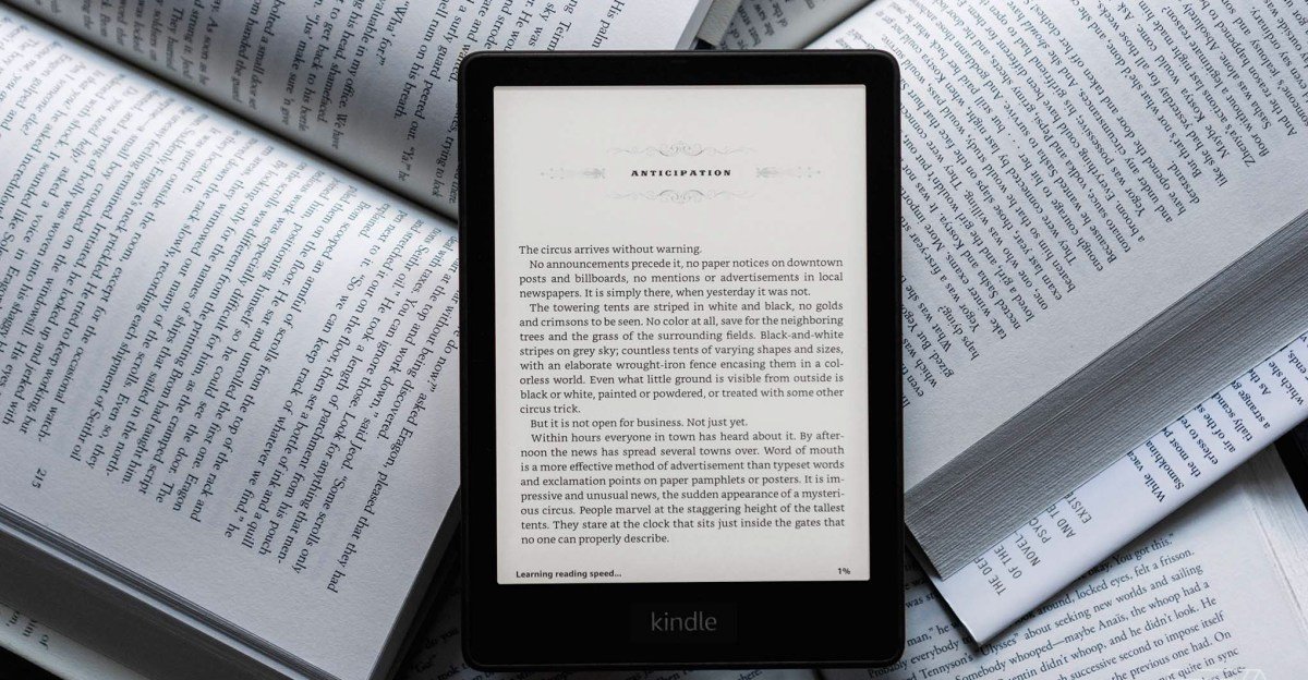 A refurbished 2021 Kindle Paperwhite e-reader displaying text on its screen, highlighting the device's sleek design and readability.