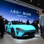 Un SUV premium chinois exposé au Salon de l'auto de Pékin, symbolisant l'offensive des marques locales sur le marché du luxe automobile.
