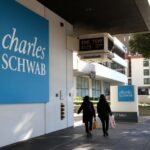 A modern financial building with 'Schwab' branding, symbolizing Charles Schwab's strategic entry into digital asset trading.