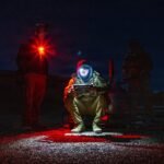 A soldier looking at multiple digital screens, symbolizing data overload, with a phone icon subtly integrated into the scene.