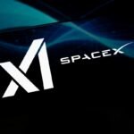 Smartphone screen displaying xAI and SpaceX logos, reflecting an abstract black and blue illustration.