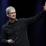 Tim Cook on stage presenting a new Apple product