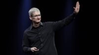 Tim Cook on stage presenting a new Apple product