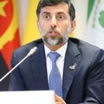 UAE Energy Minister Suhail Al Mazrouei at an OPEC meeting, discussing the nation's strategic energy future.