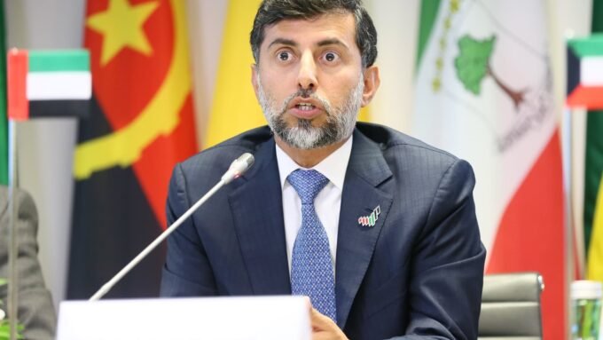 UAE Energy Minister Suhail Al Mazrouei at an OPEC meeting, discussing the nation's strategic energy future.