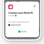A World ID orb with the Tinder logo superimposed, symbolizing identity verification for dating apps.