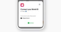 A World ID orb with the Tinder logo superimposed, symbolizing identity verification for dating apps.