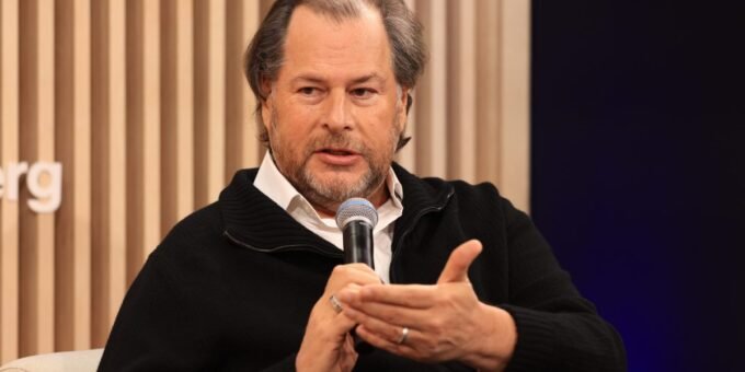 Salesforce CEO Marc Benioff discussing AI's impact on the tech job market with a graph showing sales growth.