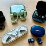 Shokz OpenDots One open earbuds, a top pick for 2026, shown in use, highlighting their comfortable and secure clip-on design.