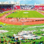 Joueurs du Raja et du Wydad lors d'un derby casablancais en Botola Pro D1, symbolisant l'intensité et l'enjeu du match.