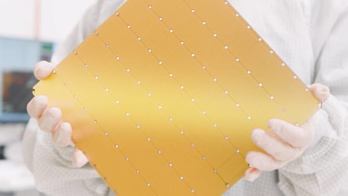 A close-up view of the Cerebras Wafer-Scale Engine (WSE) chip, showcasing its massive size and intricate design.