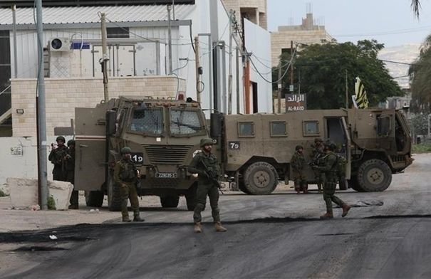 جدار الفصل في بلدة الرام شمال القدس حيث استشهد الشاب الفلسطيني