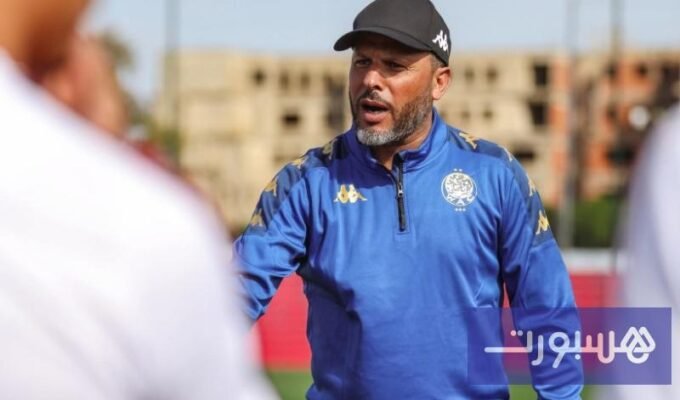 صورة لجماهير الوداد "الوينرز" أو للمدرب محمد بنشريفة