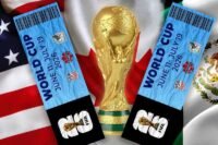 شعار كأس العالم 2026 مع تذاكر مباريات وخلفية ملاعب أمريكا الشمالية