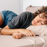 Illustration of a healthy brain or a person experiencing deep, restorative sleep, symbolizing the link between sleep stages and cognitive well-being.