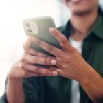 Your Calls Aren't Private By Default: Top Apps for End-to-End Encrypted Conversations 6 A smartphone screen displaying a secure messaging app icon, with a padlock symbol, representing encrypted calls and digital privacy.