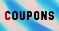 A hand holding a smartphone displaying the Groupon app with various discount offers and promo codes.