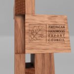Henry Marks' Clerkenwell Design Week Award, a sculptural piece made from American cherry wood, showcasing its unique grain and texture.