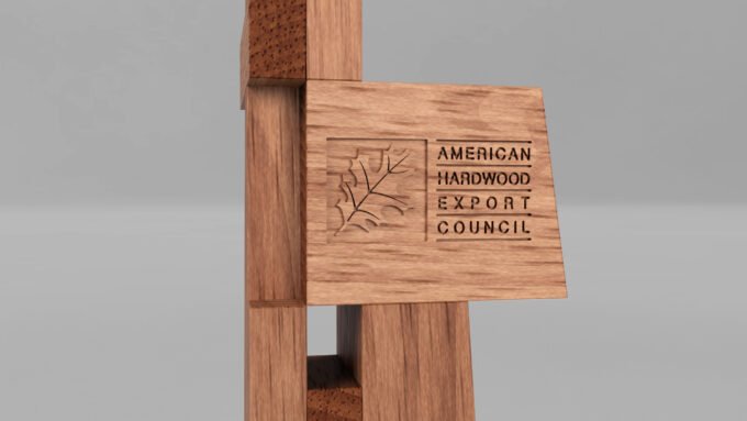 Henry Marks' Clerkenwell Design Week Award, a sculptural piece made from American cherry wood, showcasing its unique grain and texture.