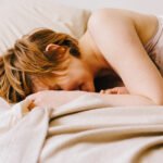 Woman experiencing relief and relaxation, symbolizing the benefits of self-pleasure during menopause.