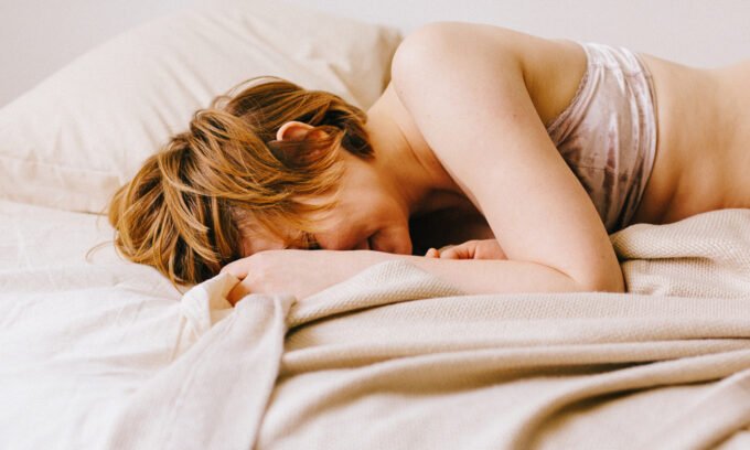 Woman experiencing relief and relaxation, symbolizing the benefits of self-pleasure during menopause.