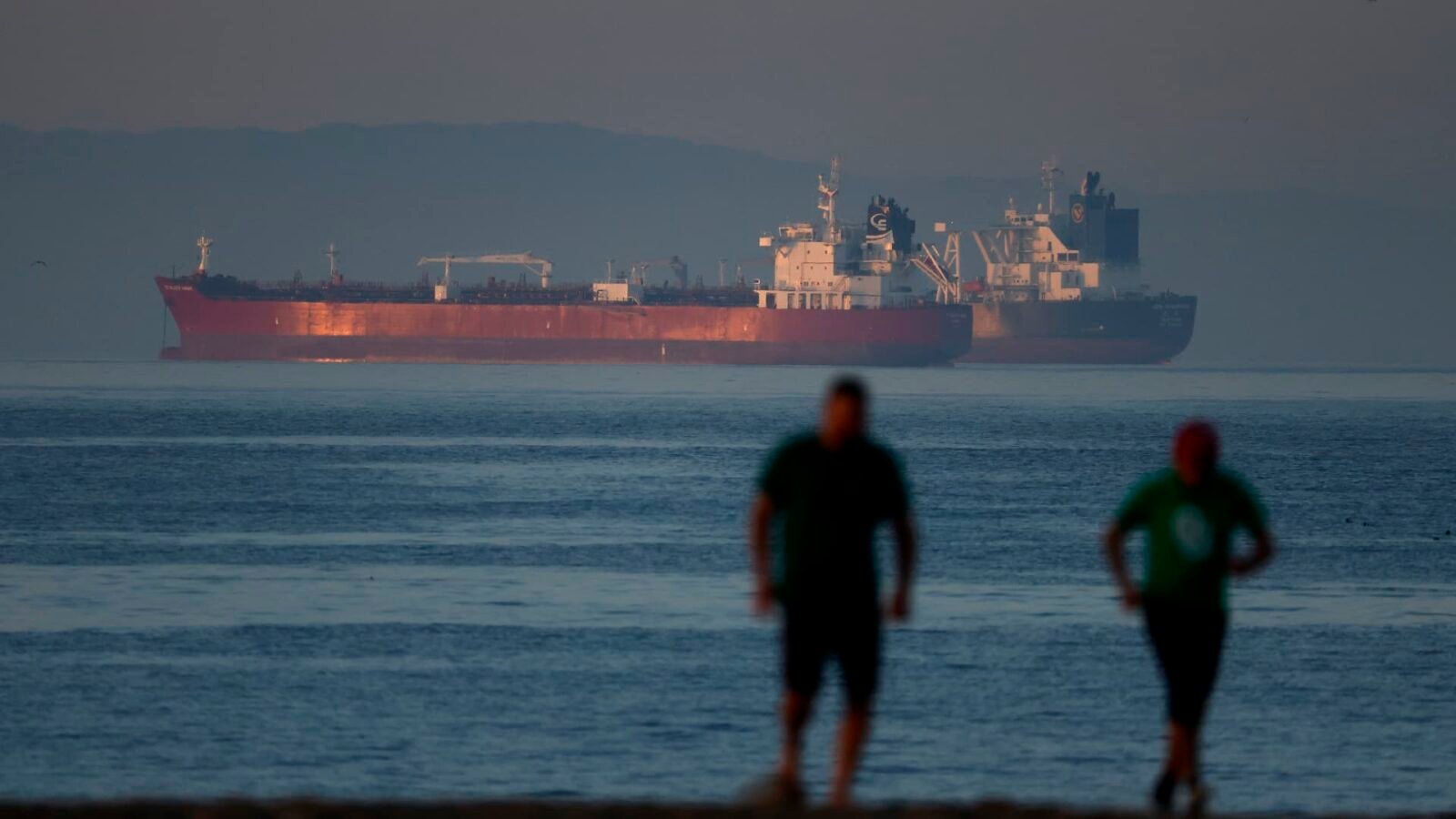 Liberia-flagged crude oil tanker Shenlong Suezmax docked at Mumbai Port after navigating the Strait of Hormuz amidst West Asia conflict.
