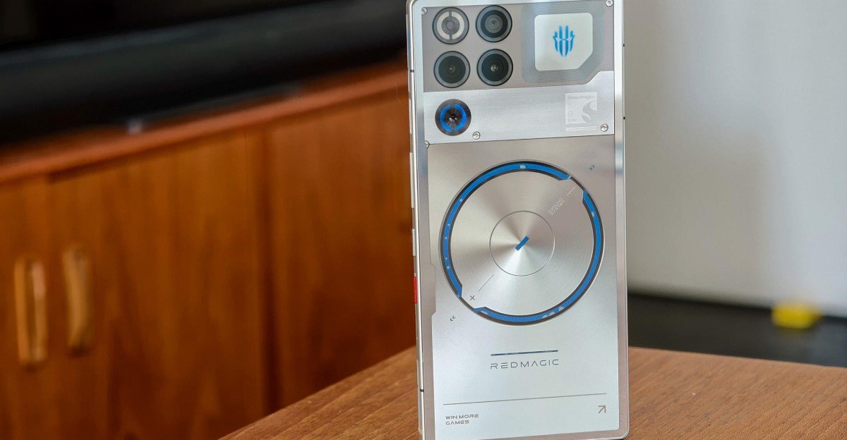 Redmagic 11S Pro gaming phone with a semi-transparent back panel showcasing its fluorescent liquid cooling system in motion.