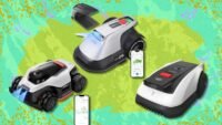 Three different robot lawn mowers on a green lawn, showcasing smart home gardening technology.