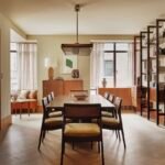 Luxurious interior of the renovated Rockefeller Apartment, showcasing Khaya mahogany and Portoro marble accents.