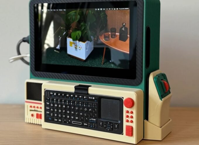 A vibrant, custom-built cyberdeck made from salvaged electronics, showcasing a unique, retro-futuristic design.