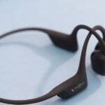 Shokz OpenRun Pro 2 bone conduction headphones in black, showcasing their open-ear design.