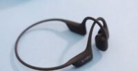 Shokz OpenRun Pro 2 bone conduction headphones in black, showcasing their open-ear design.