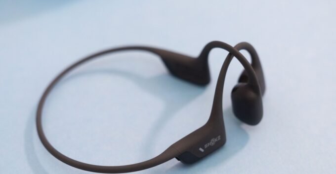 Shokz OpenRun Pro 2 bone conduction headphones in black, showcasing their open-ear design.