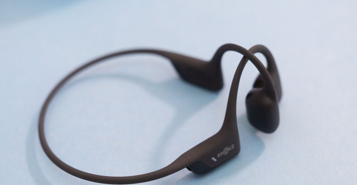 Shokz OpenRun Pro 2 bone conduction headphones in black, showcasing their open-ear design.