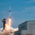 SpaceX Falcon 9 rocket launching, symbolizing the company's advanced space technology and government partnerships.