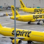 Spirit Airlines airplanes parked at Fort Lauderdale - Hollywood International Airport, symbolizing the airline's shutdown.