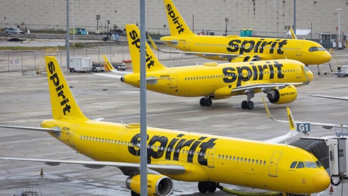 Spirit Airlines airplanes parked at Fort Lauderdale - Hollywood International Airport, symbolizing the airline's shutdown.